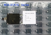 Przetłoczenie przycisku do panelu zamontowane termowyłącznik TE wyłącznik W23-X1A1G-15